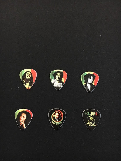 Dunlop Bob Marley Rasta Series Medium plektrat tinalaatikossa - Aron Soitin